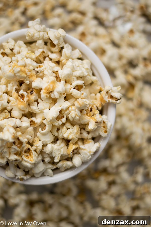 A bowl filled with freshly made healthy caramel popcorn, ready to be enjoyed.