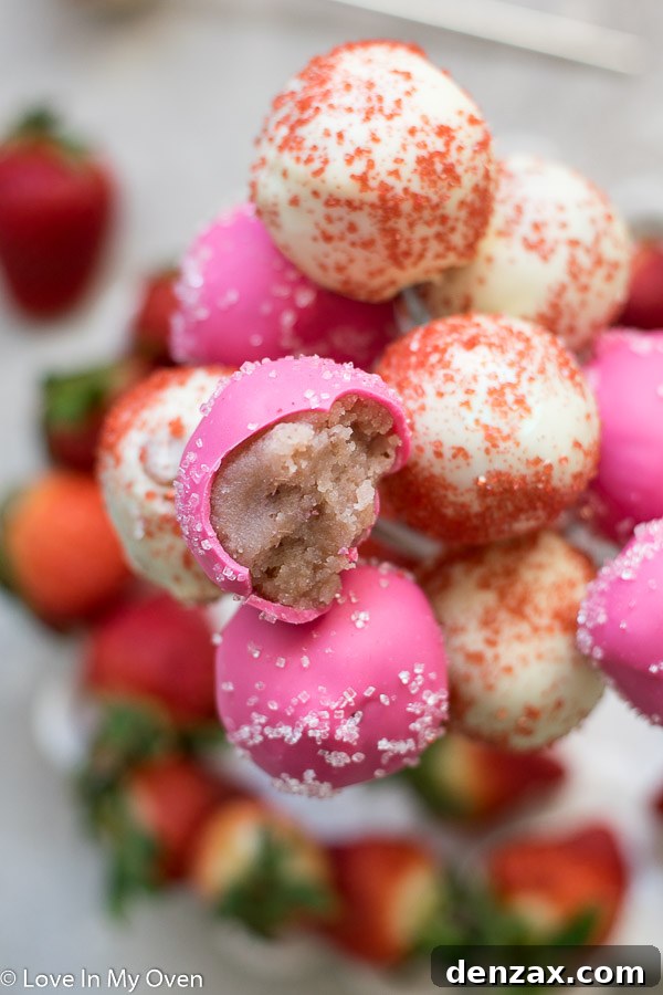 Assorted strawberry cake pops ready for dipping