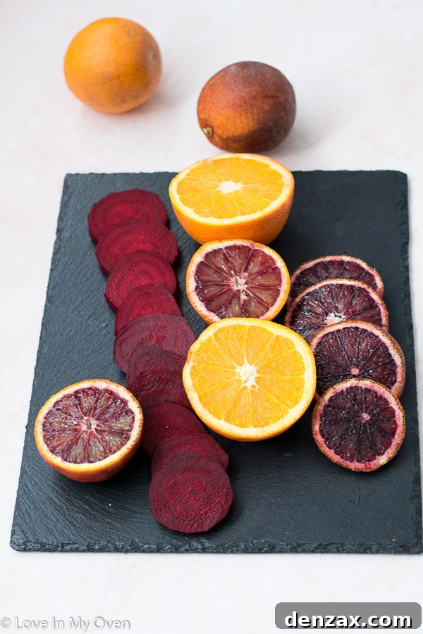 Crimson Citrus Salad 4 Hands slicing fresh orange for a vibrant salad