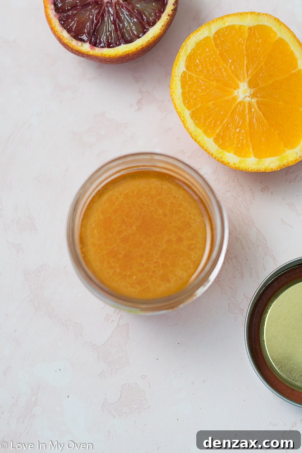Crimson Citrus Salad 5 Ingredients for citrus salad dressing being prepared in a jar