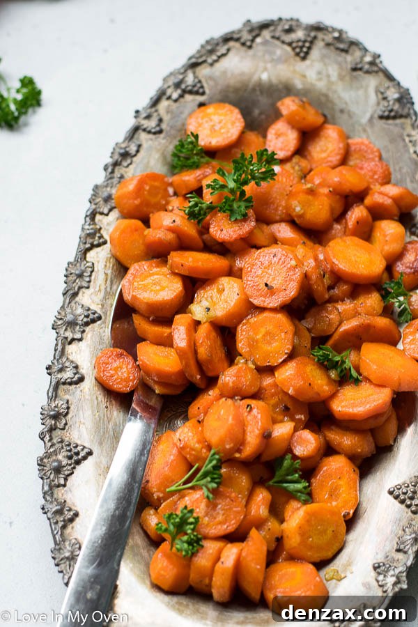 Garlic Butter Roasted Carrots in a serving bowl, ready to be enjoyed