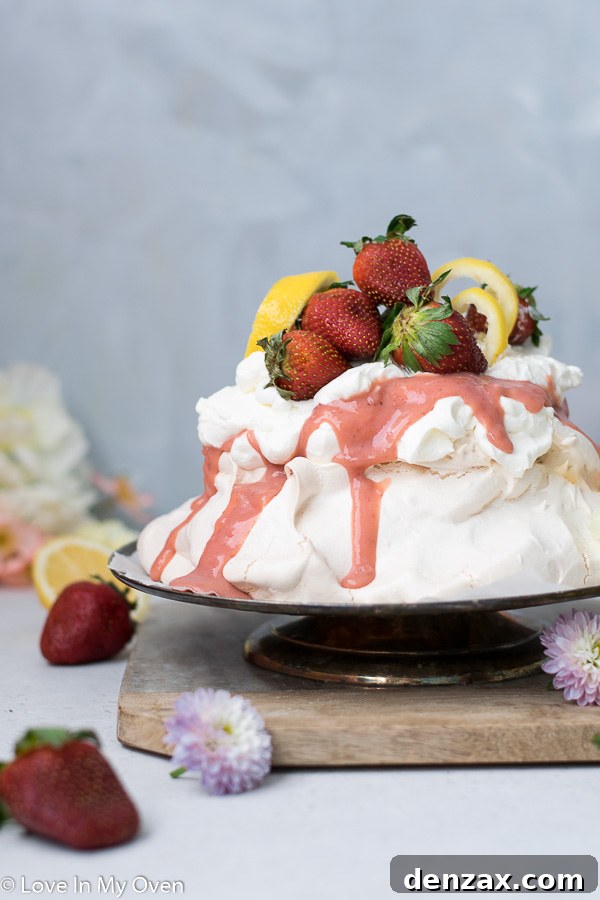 Delicious strawberry lemon curd pavlova with whipped cream and fresh fruit