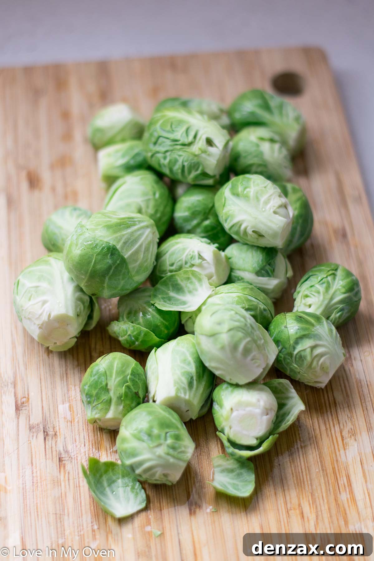 Ingredients for sautéed shredded Brussels sprouts: sprouts, garlic, butter