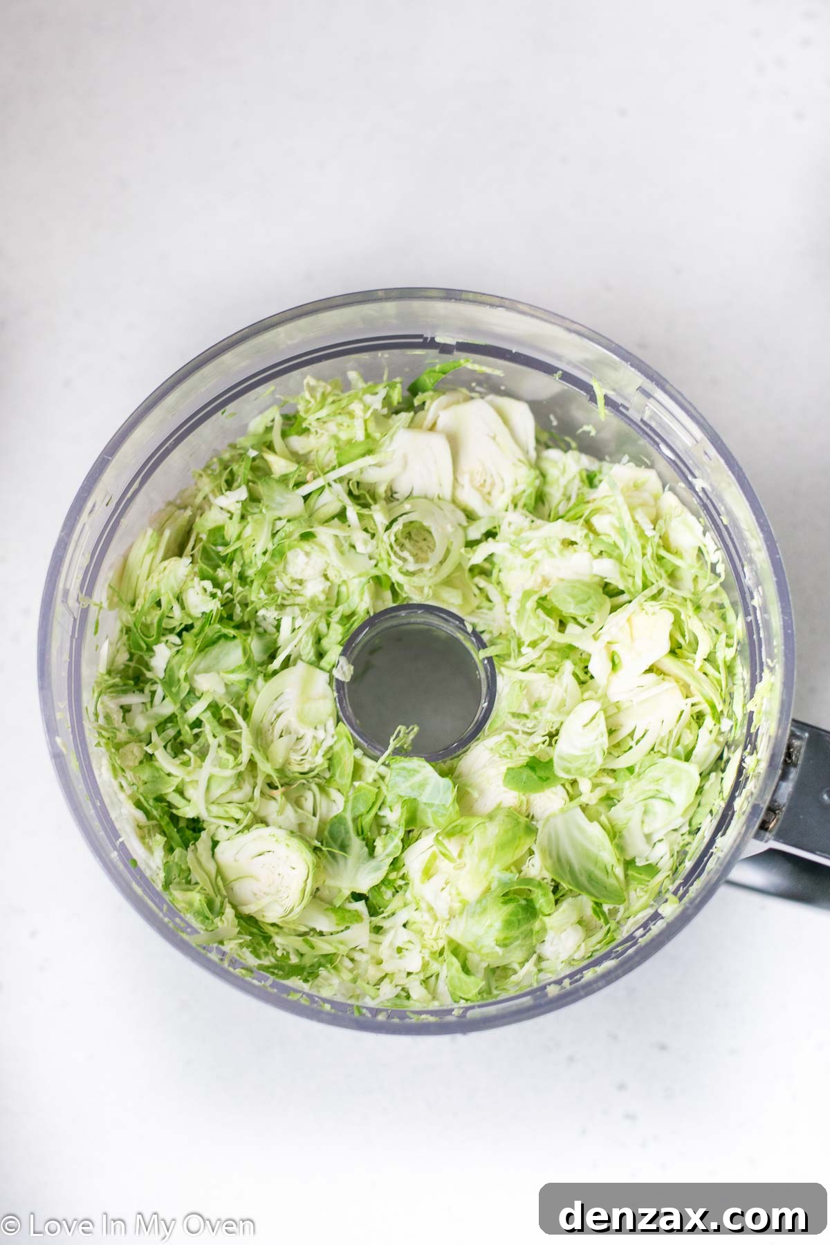 Shredded Brussels sprouts in a food processor