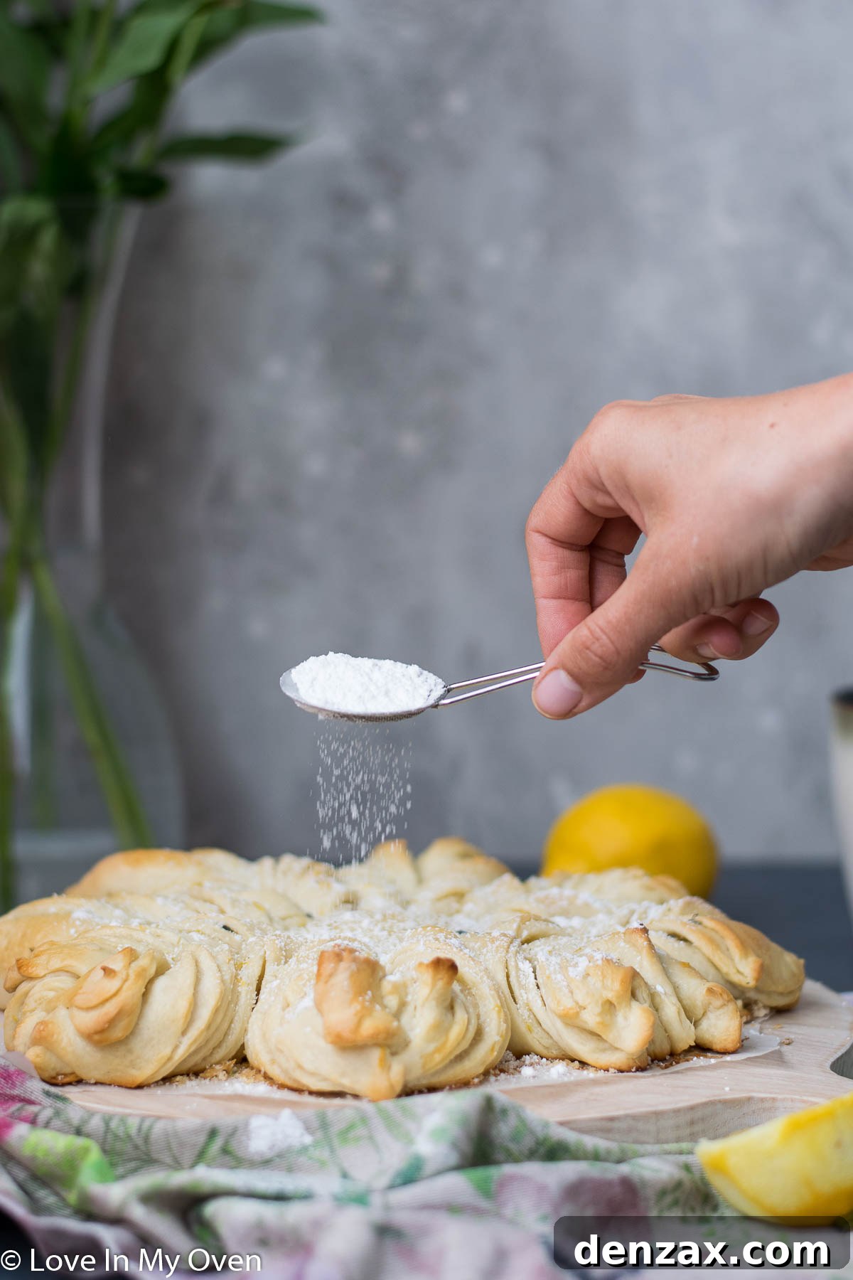 Finished Star Lemon Lavender Bread, elegantly dusted with powdered sugar, ready to be served and enjoyed.