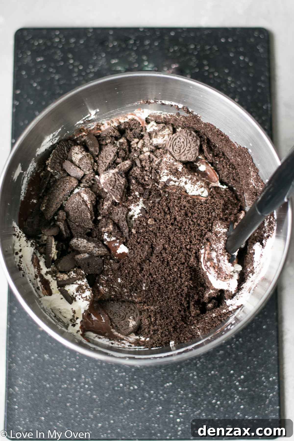 Folding ingredients into whipped cream for no-churn ice cream