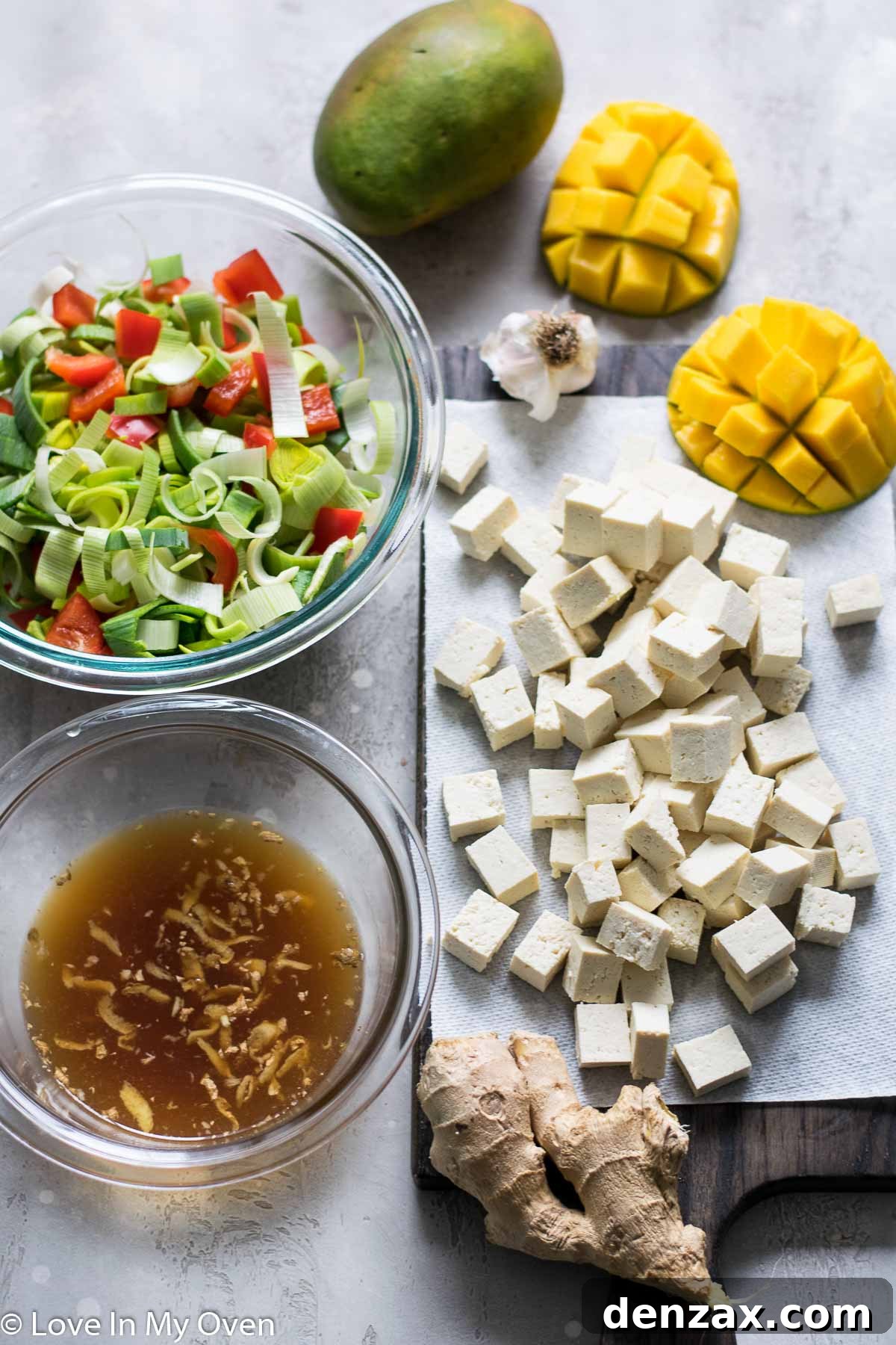 Diced vegetables and tofu prepped for stir fry
