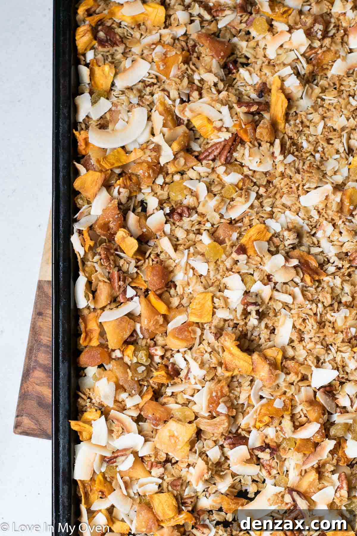 Serving of tropical granola in a bowl, ready to be enjoyed