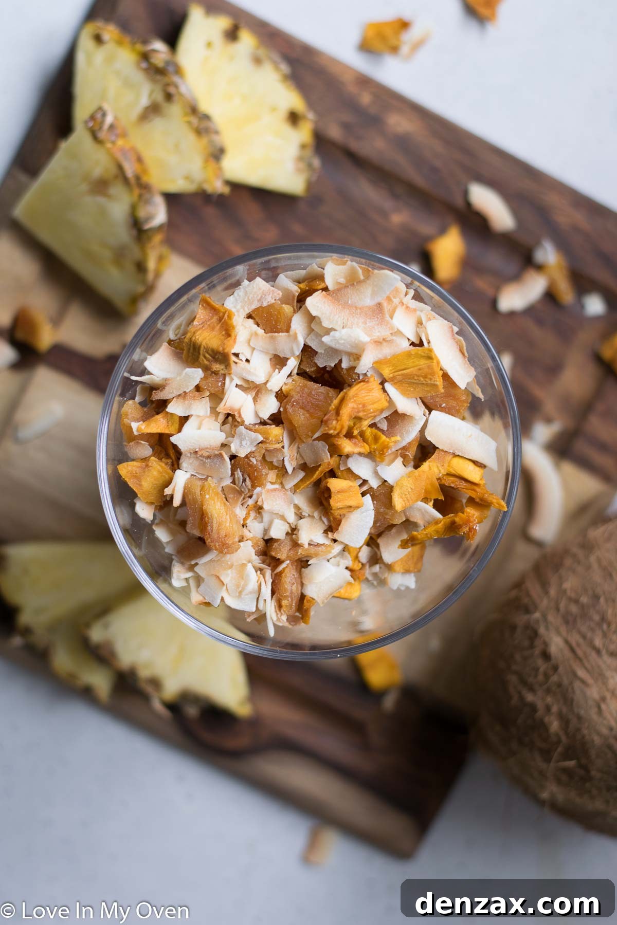 Overhead shot of tropical granola with fresh fruit and yogurt