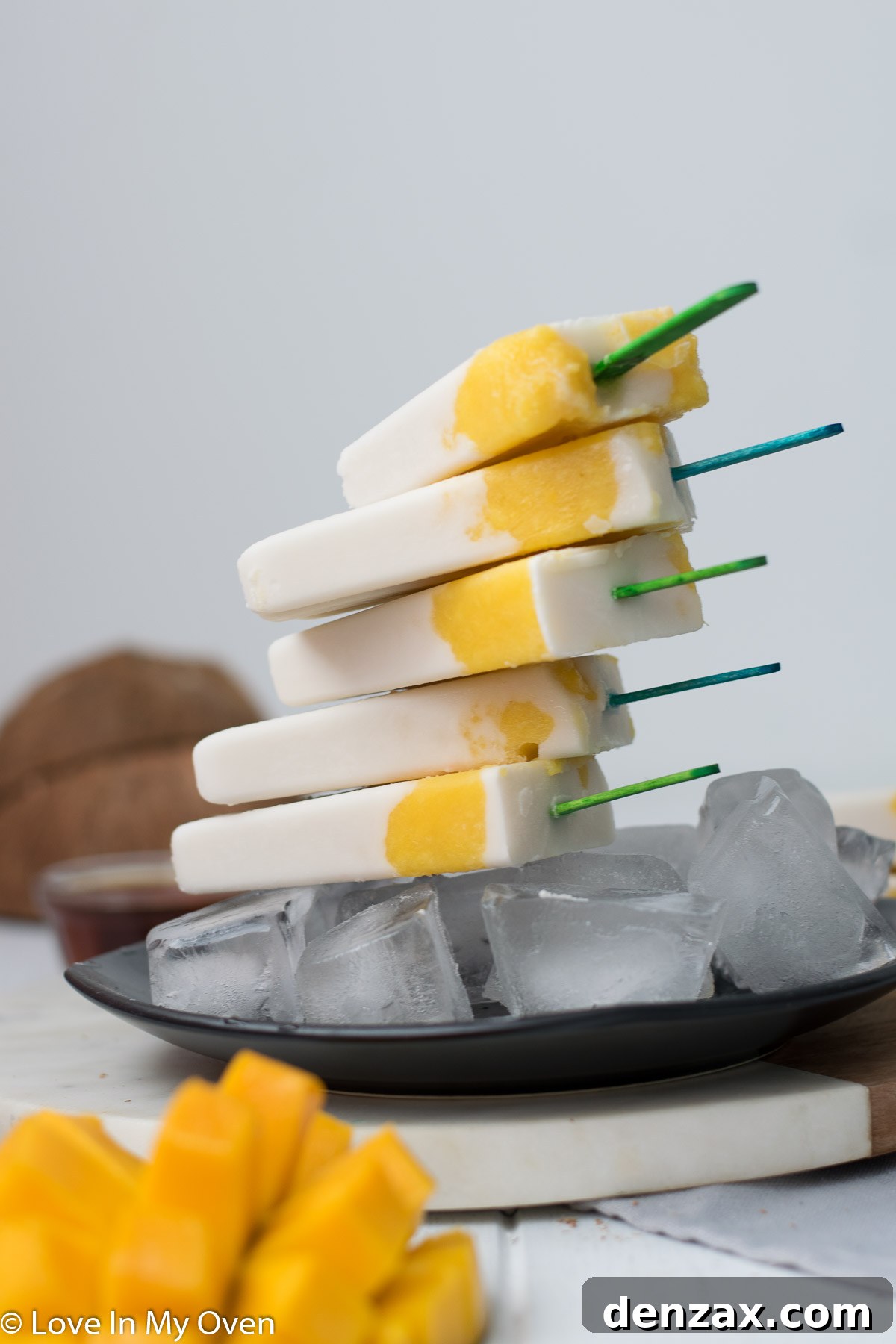 Refreshing homemade mango coconut popsicles