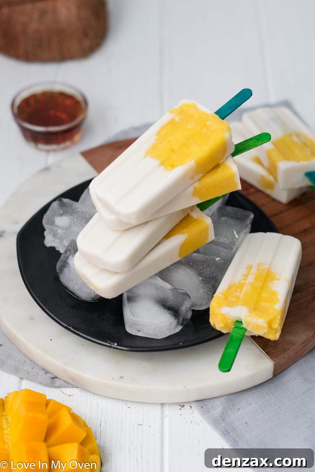Close-up of a single mango coconut popsicle