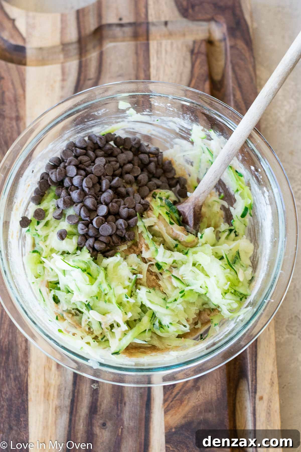Mixing zucchini bread batter with chocolate chips