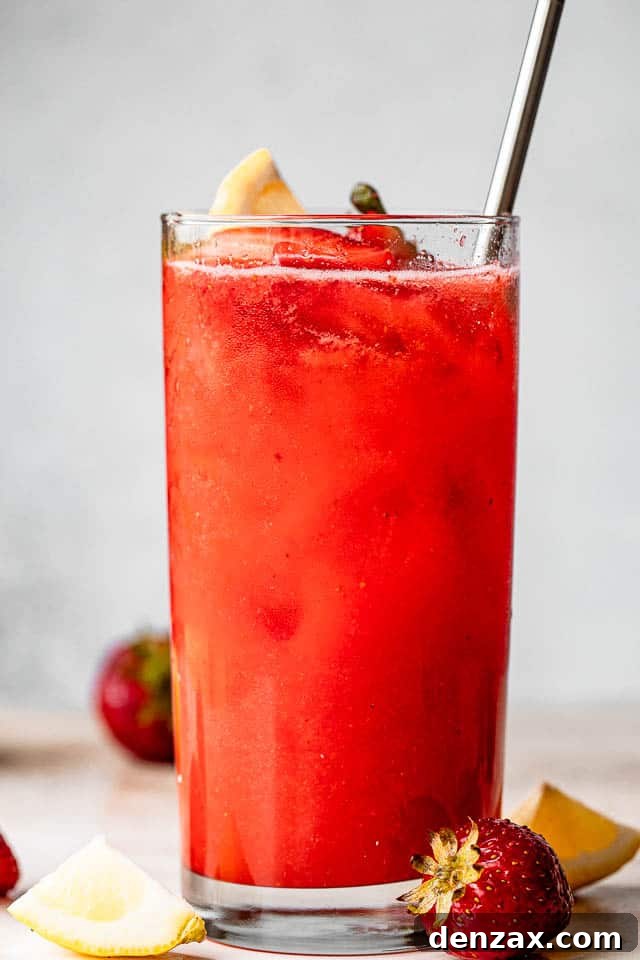 tall glass gilled with strawberry lemonade sangria