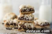 A top-down view of vegan magic bars, showcasing their beautiful, layered texture and inviting golden-brown finish.
