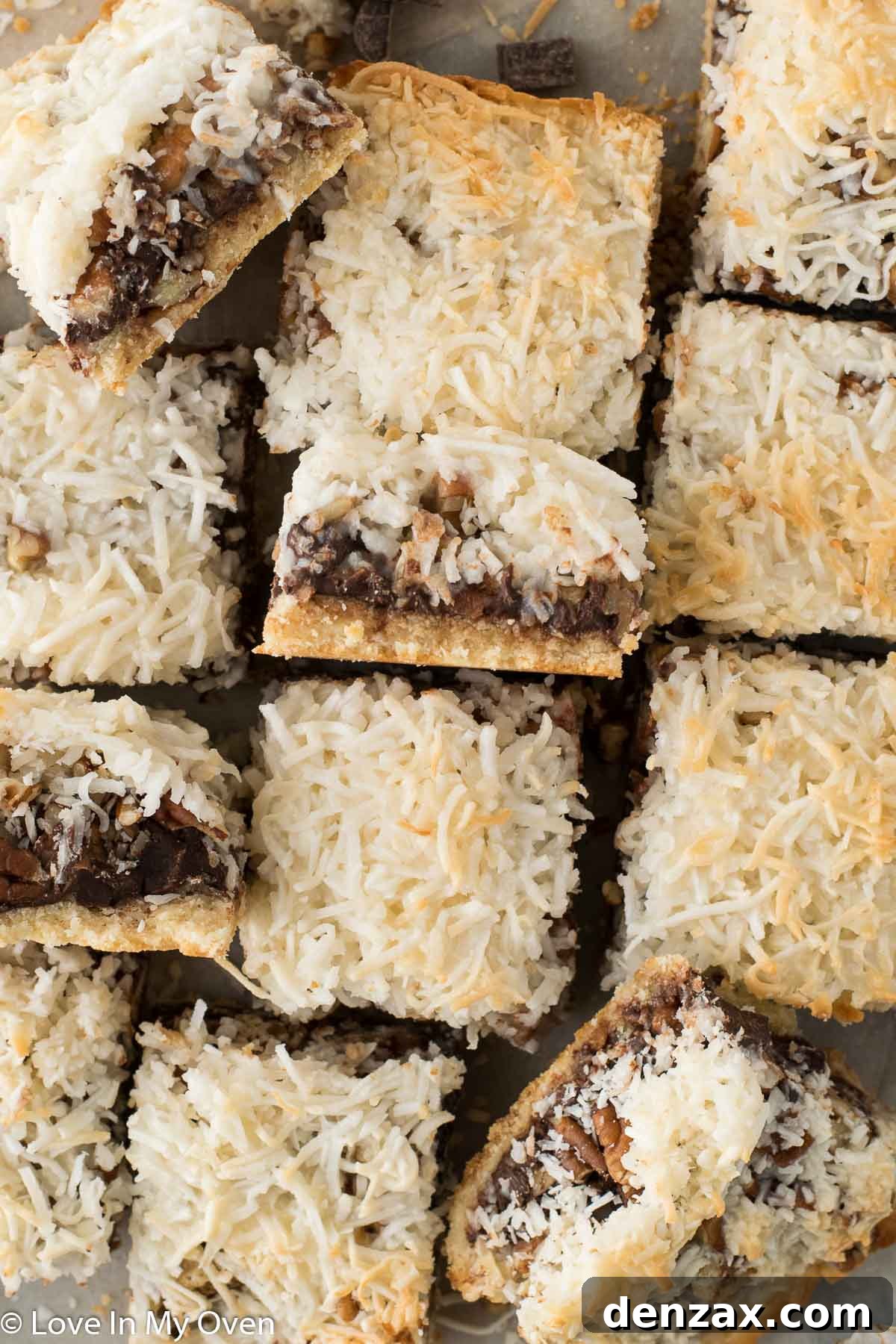 A closer view of the perfectly golden and set vegan magic bars after cooling, before being cut.