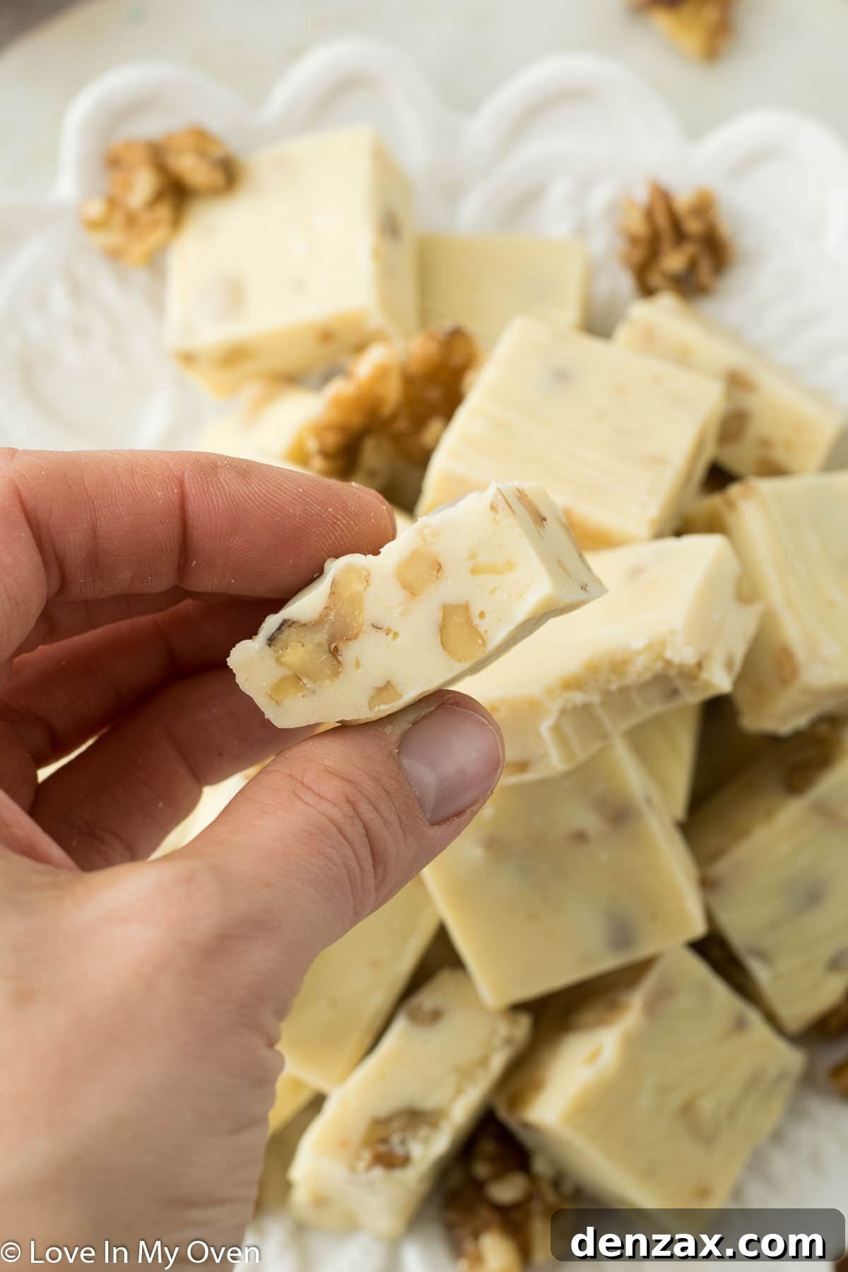 Stack of Maple Walnut Fudge with a Festive Background