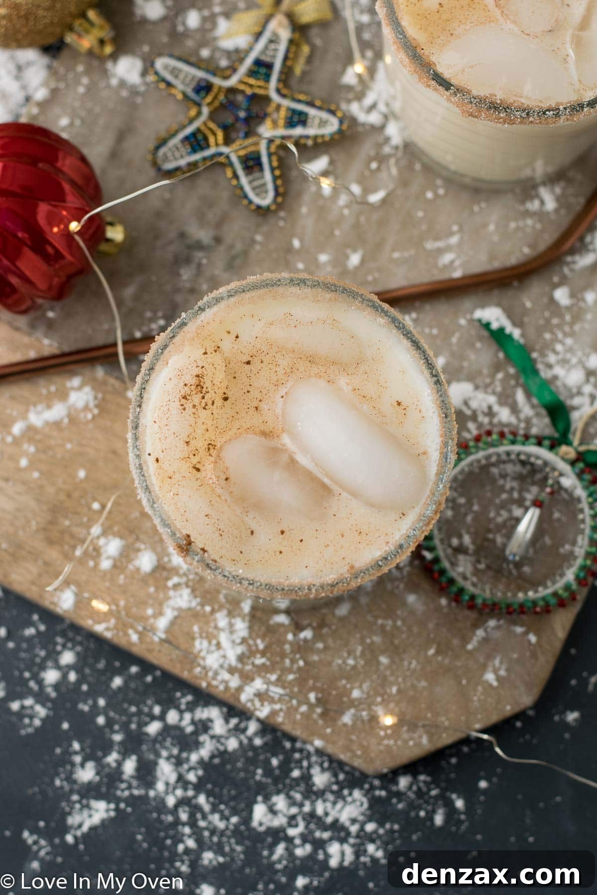 Freshly poured Vodka Eggnog Cocktail with nutmeg garnish in a stylish glass