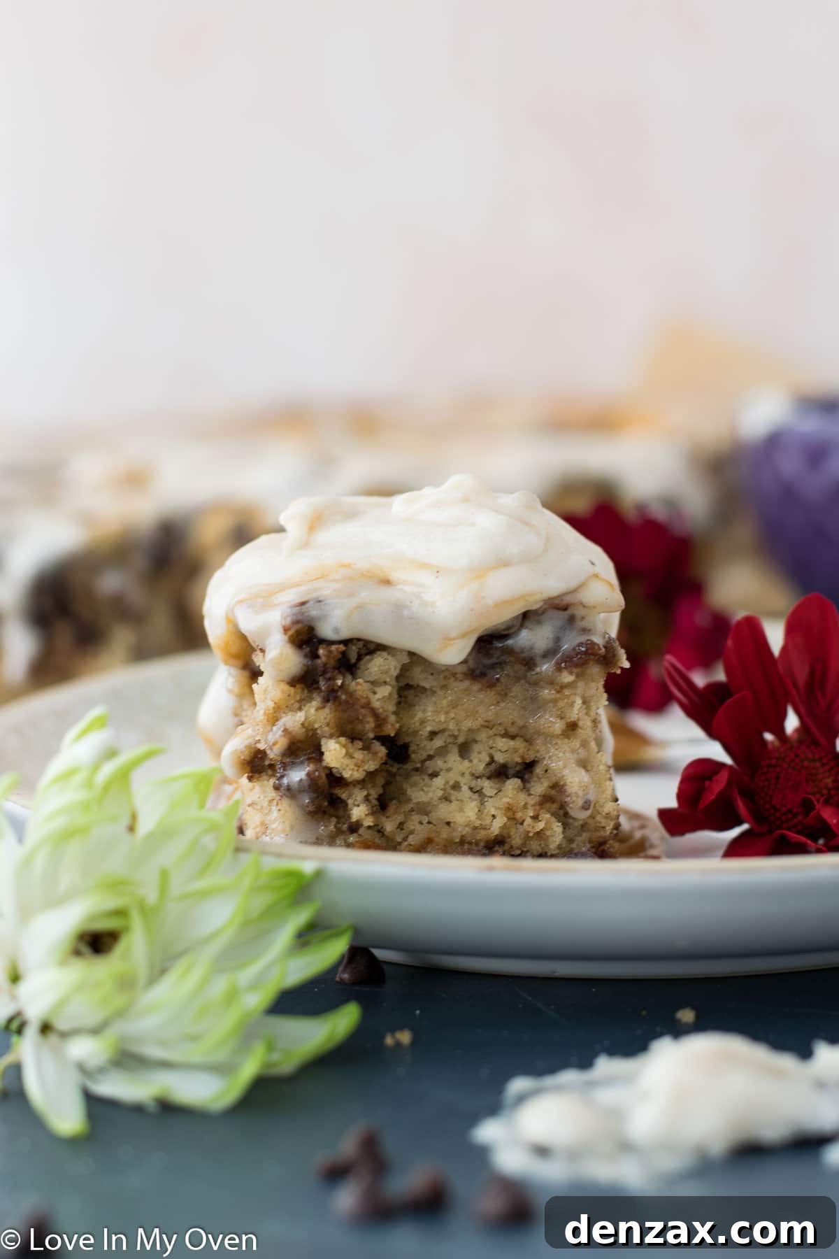 Moist and delicious gluten free banana cake slice with frosting