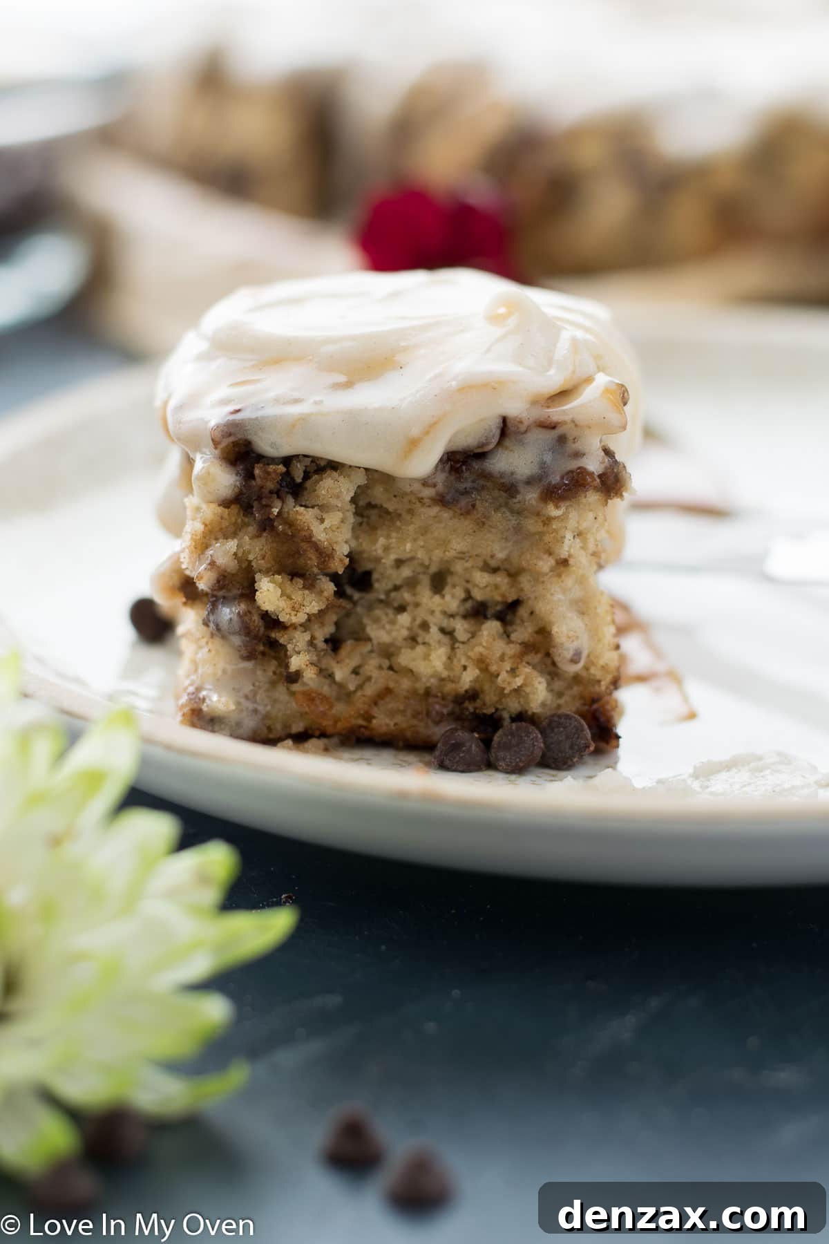 Close up of gluten free banana cake with a fork, showing moist crumb
