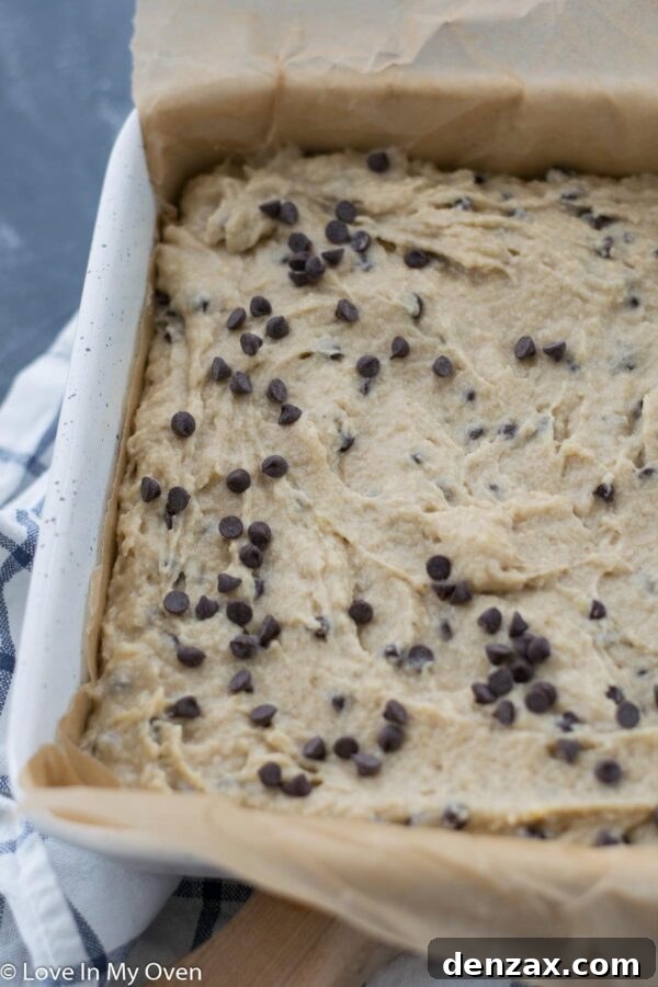 Gluten-free banana cake batter smoothed in a square baking pan