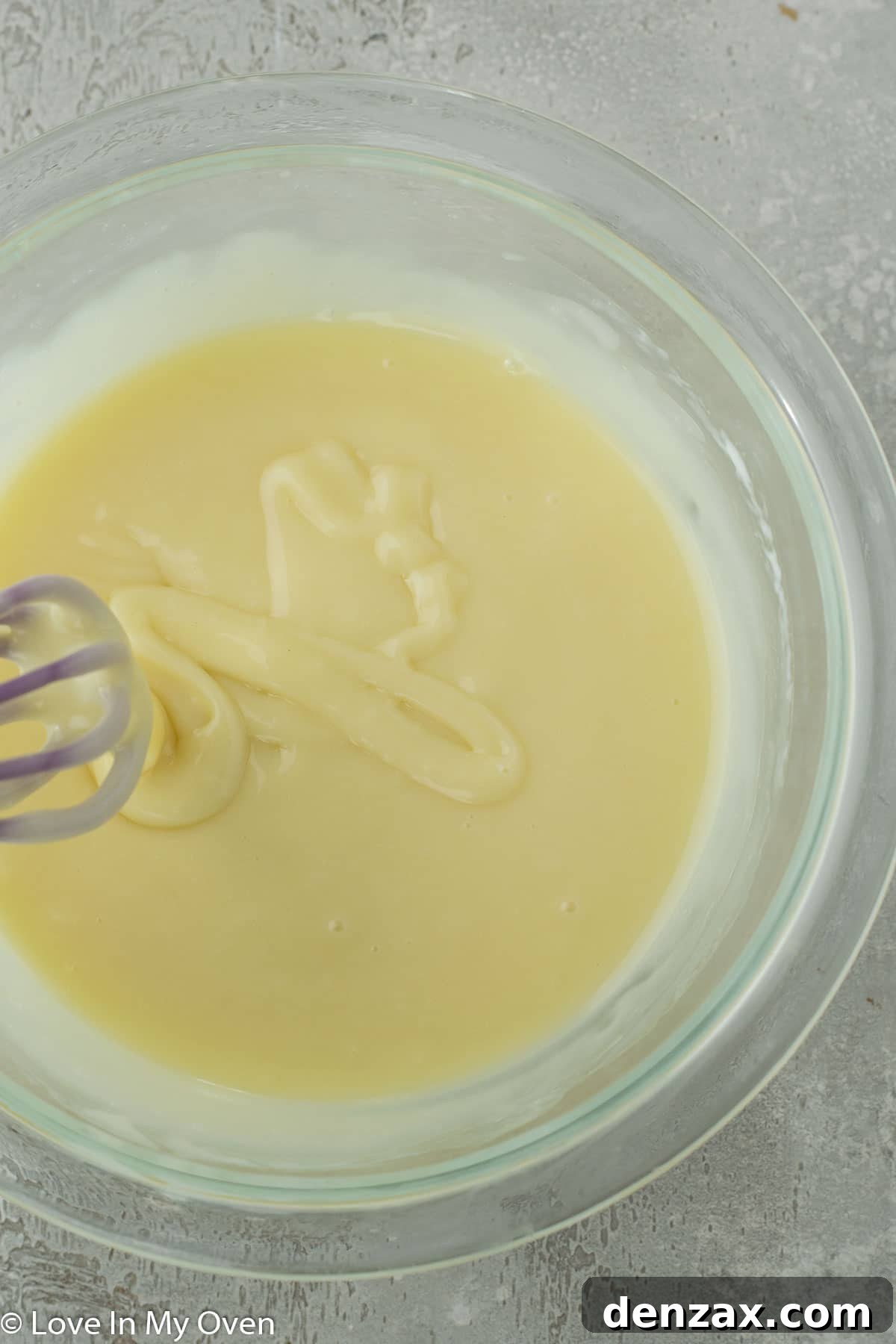 Preparing white chocolate ganache