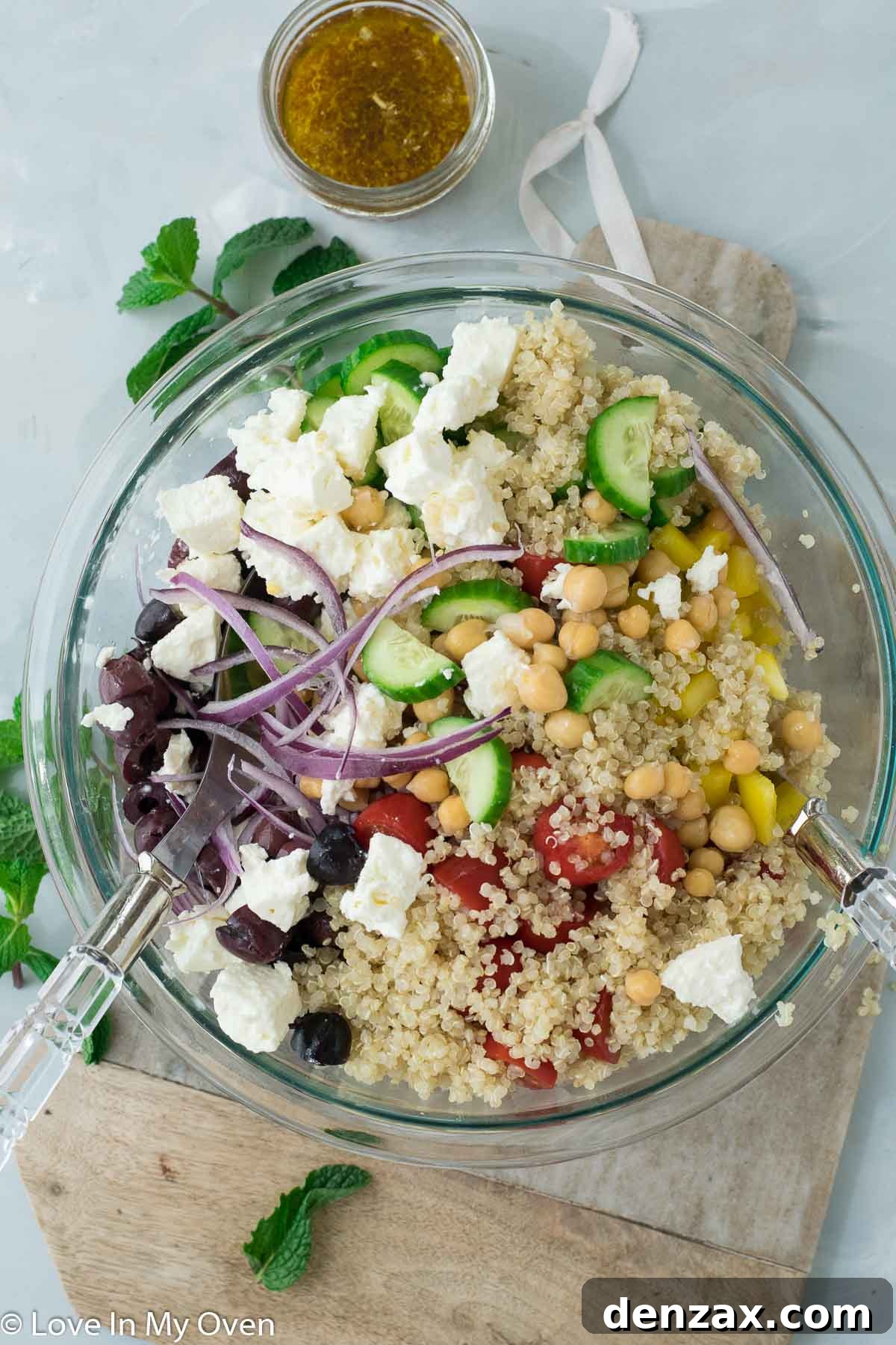 Tossed Greek Chickpea Salad with fresh mint, ready to serve.