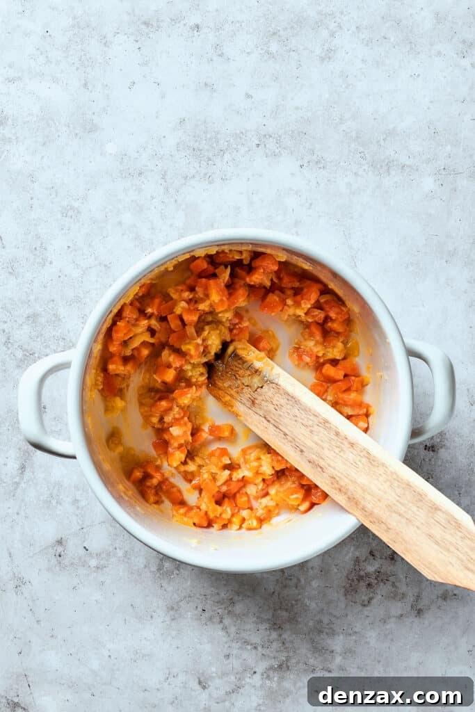 Perfectly cooked vegetables, coated with butter and flour, forming a rich roux.