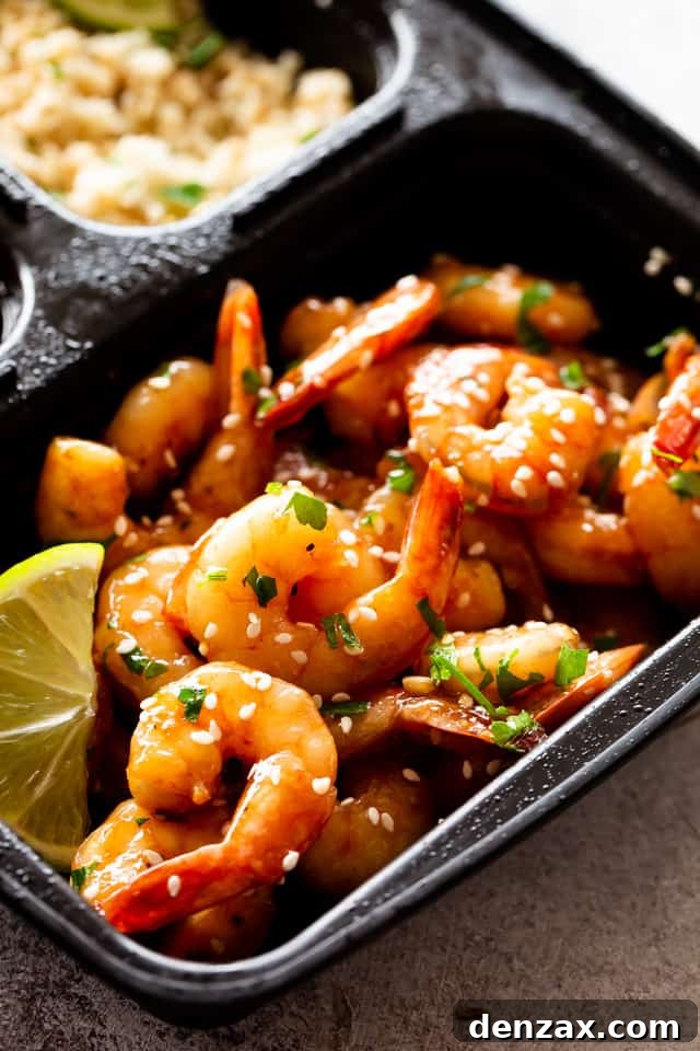 Sheet Pan Teriyaki Shrimp in a black container, ready for convenient meal prep.