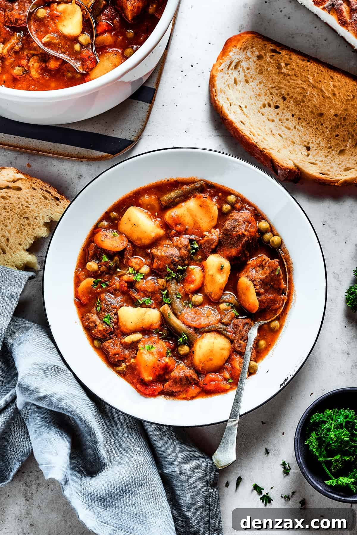 Overhead shot of beef stew with mixed vegetables, ready to be served.