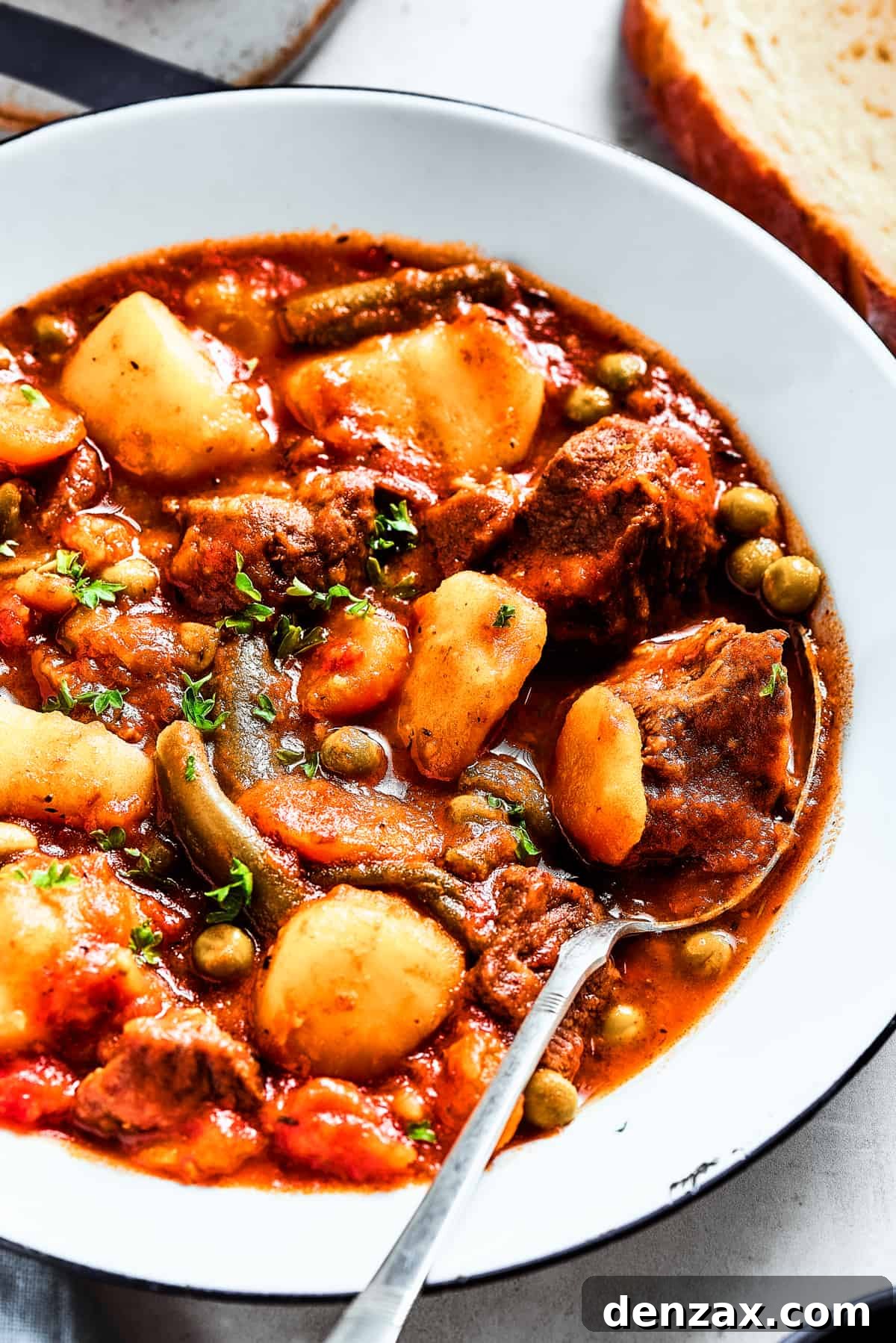 Mulligan stew featuring tender beef and a vibrant mix of fresh vegetables.
