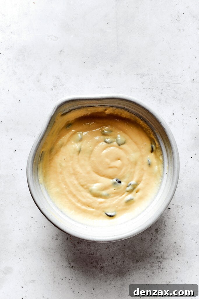 Overhead view of a bowl of chocolate chip pancake batter.