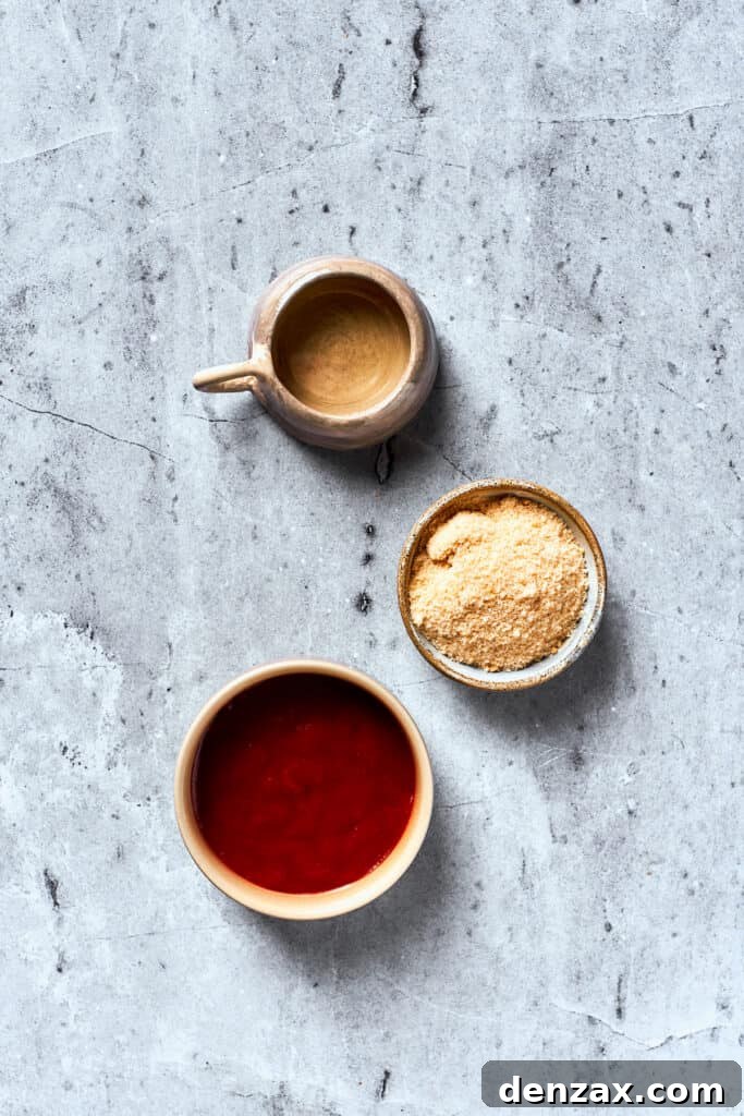 Brown sugar, ketchup, and apple cider vinegar are portioned into bowls.
