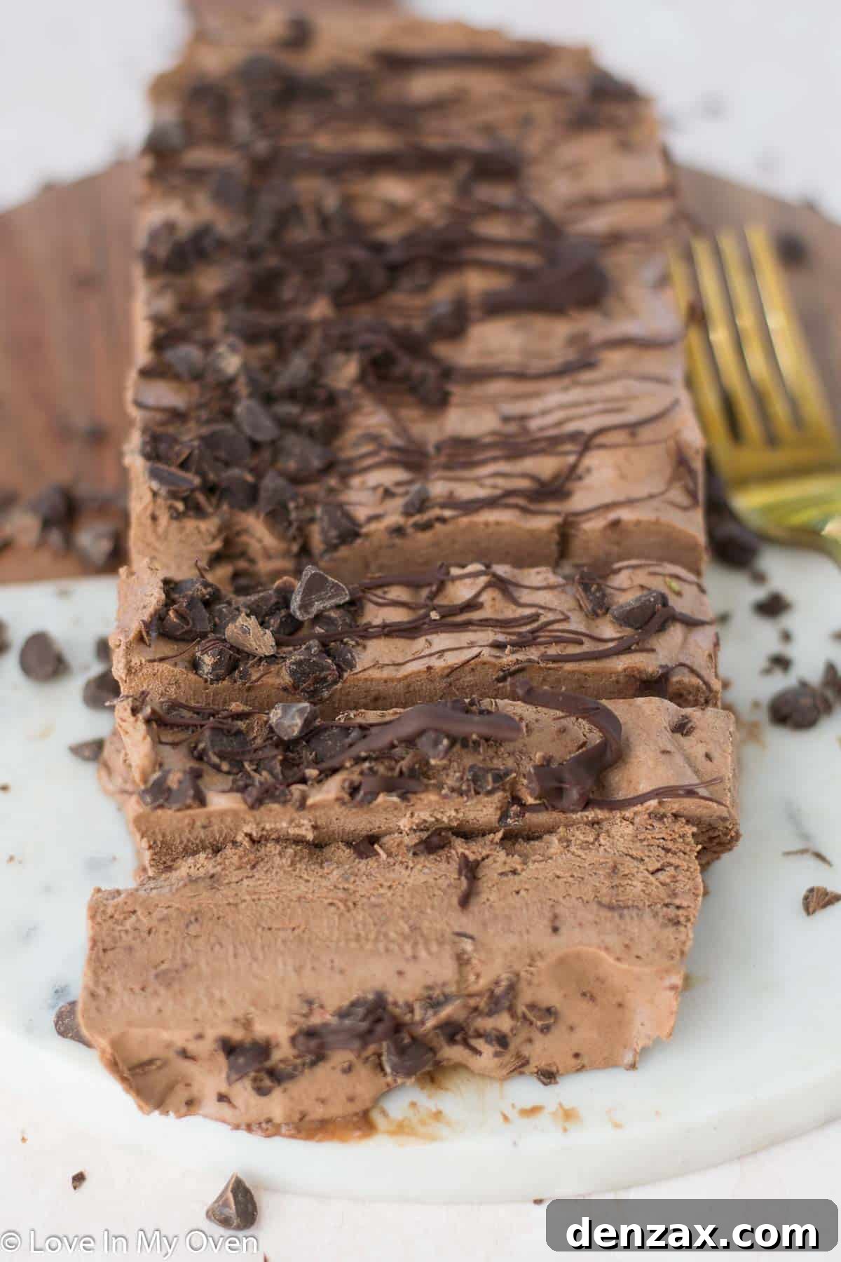 Sliced dark chocolate semifreddo on a serving platter