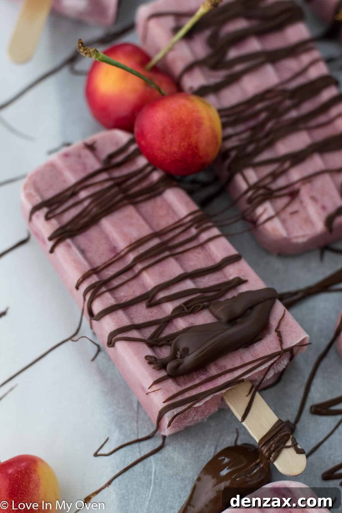 Finished Greek yogurt cherry popsicles, ready to enjoy