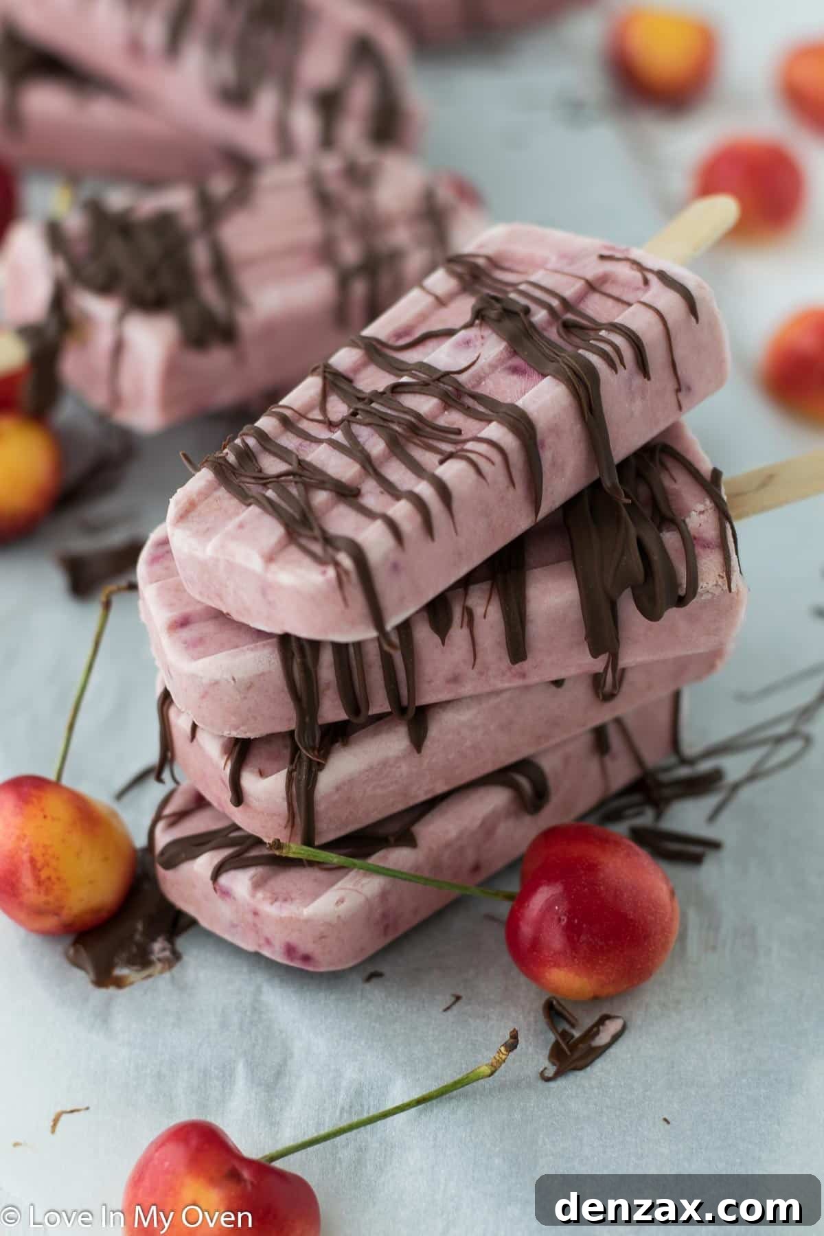 Stacked Greek yogurt cherry popsicles