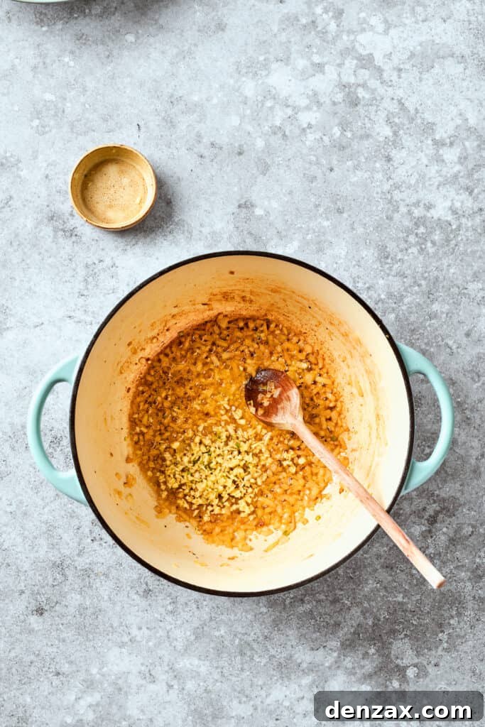 Garlic is added into the onion.