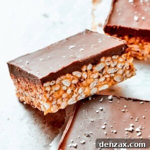 A square bar of rice krispies topped with a layer of melted chocolate.