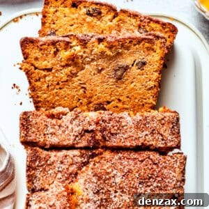 A loaf of Amish friendship bread with three slices cut from it.