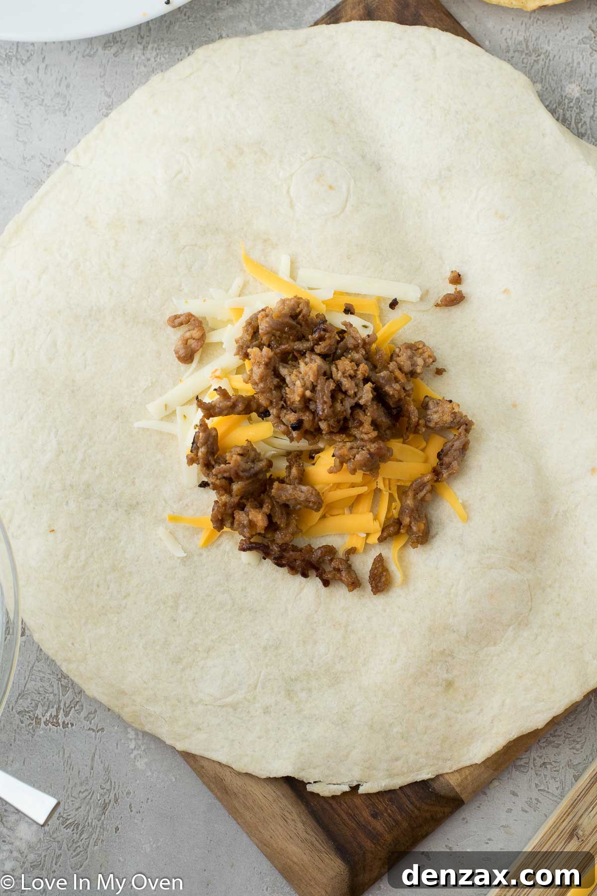 Step-by-step image of cooking chorizo for breakfast crunch wrap.