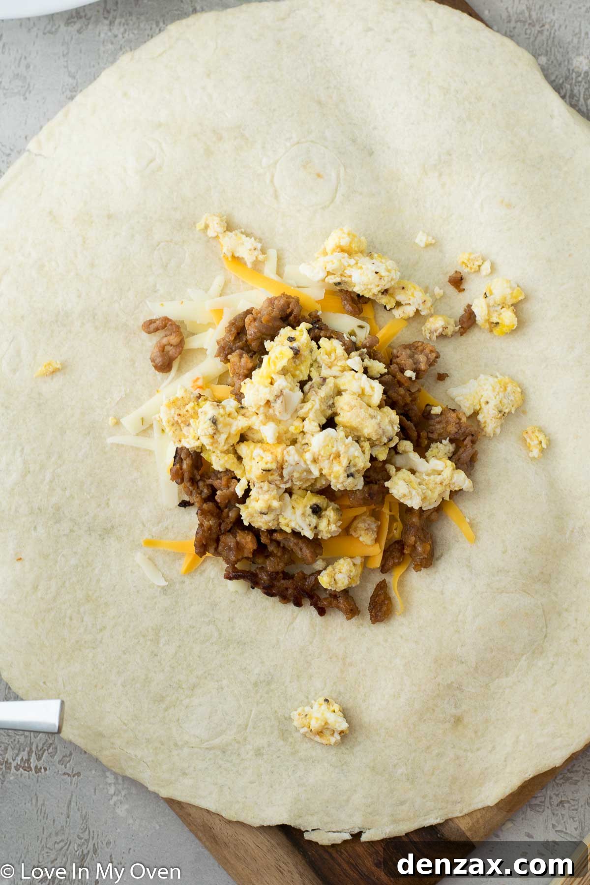 Scrambling eggs for the breakfast crunch wrap.