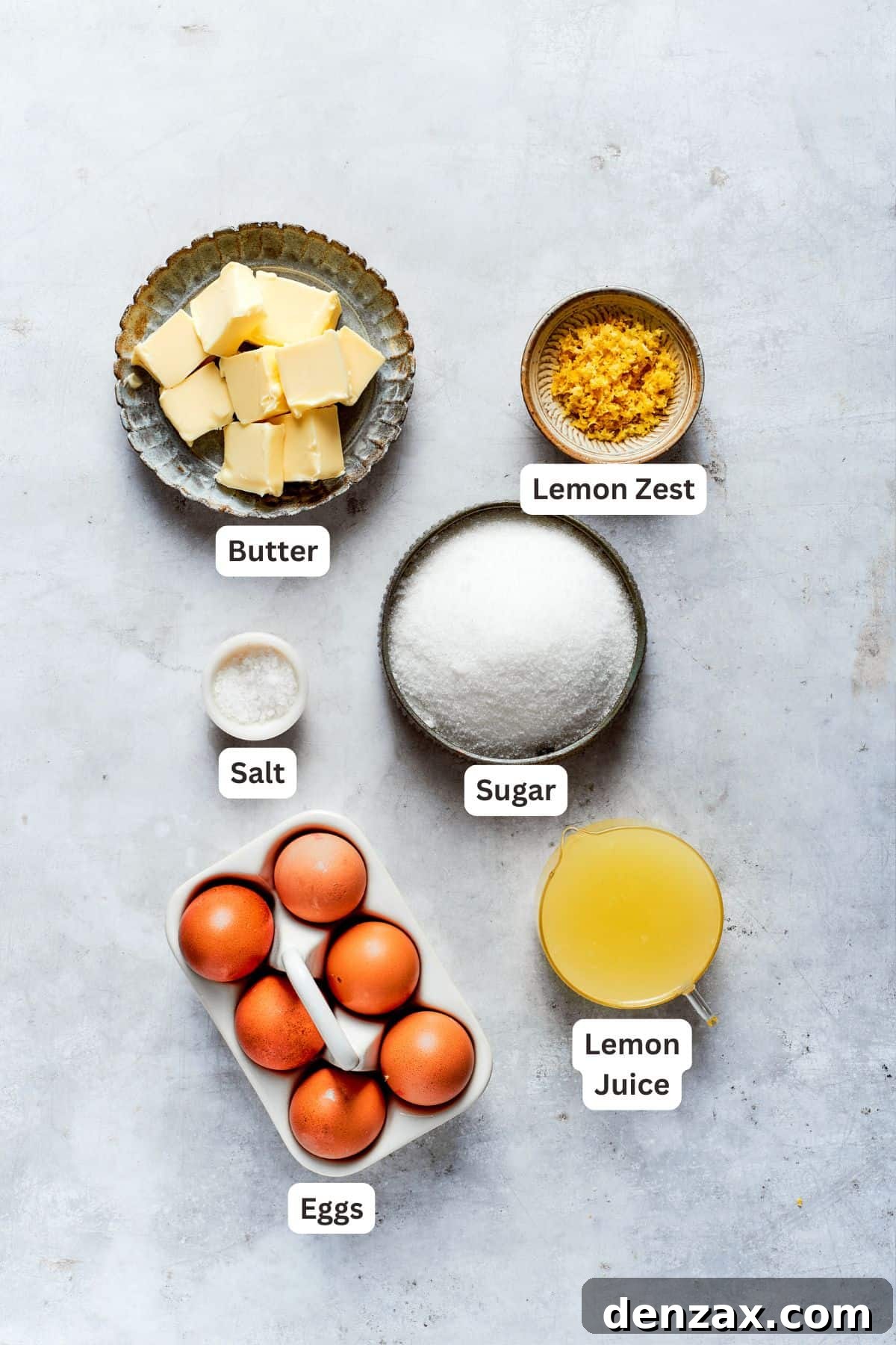 Lemon curd ingredients: unsalted butter, large eggs, granulated sugar, fresh lemon juice, lemon zest, and a pinch of salt.