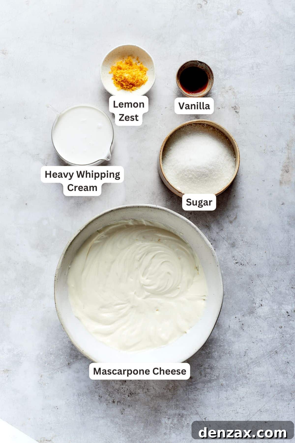 Lemon tiramisu filling ingredients: mascarpone cheese, granulated sugar, heavy cream, lemon zest, and vanilla extract.