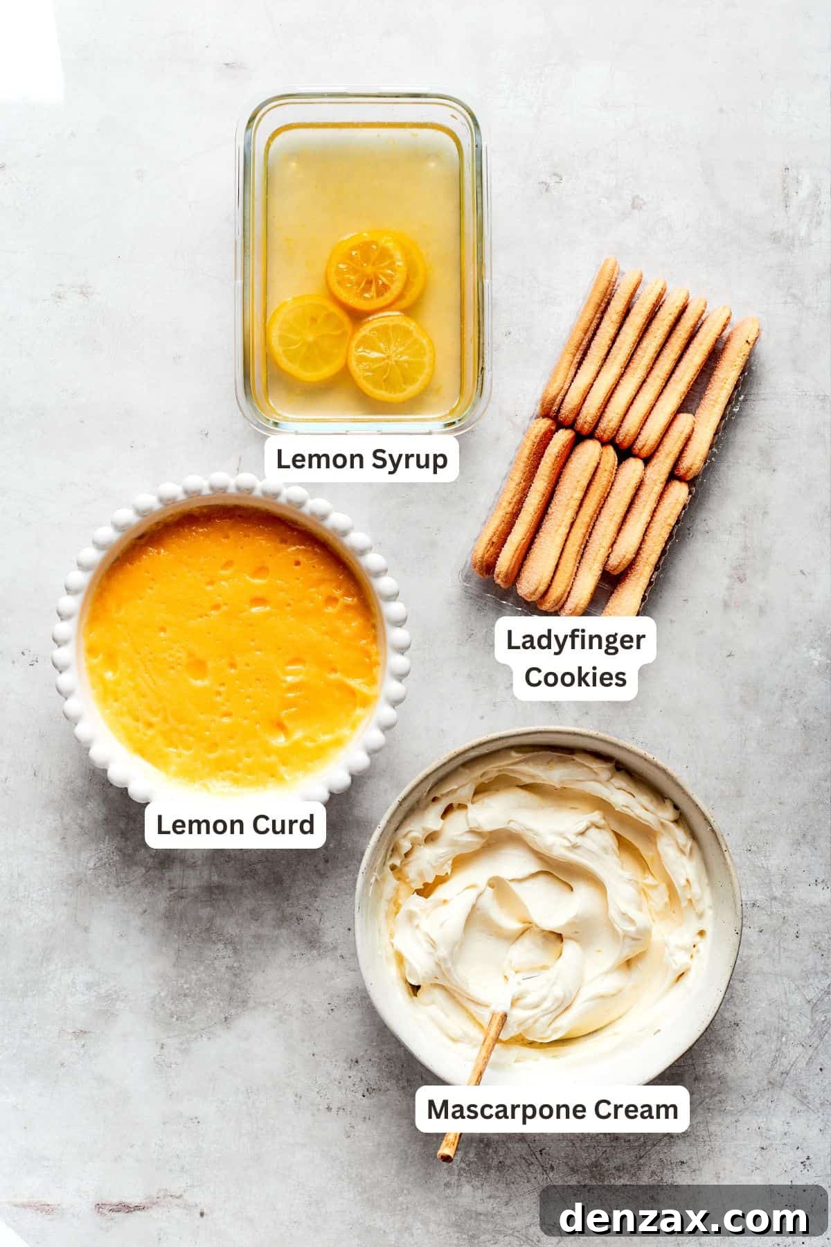 Lemon tiramisu assembly ingredients: crisp ladyfinger cookies, prepared lemon curd, creamy filling, and lemon syrup for soaking.