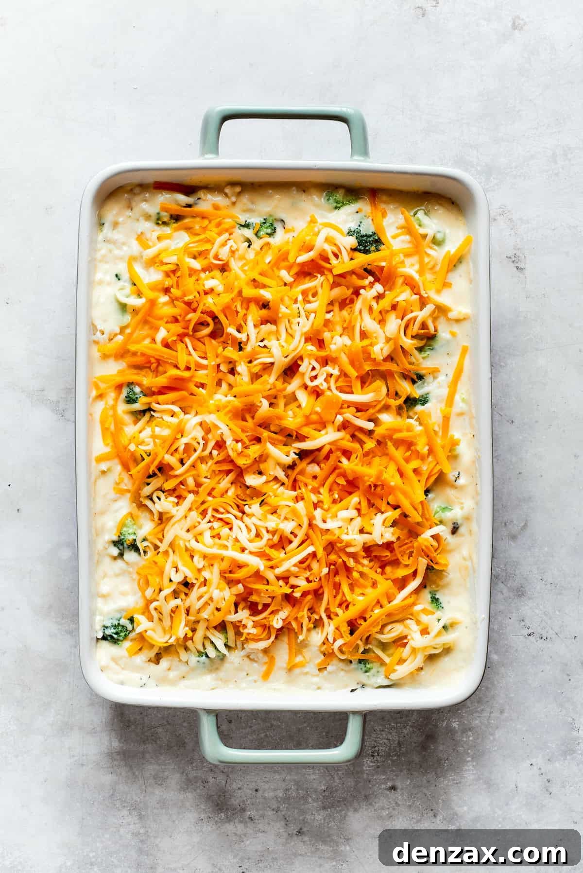 Shredded cheese tops broccoli & rice casserole.
