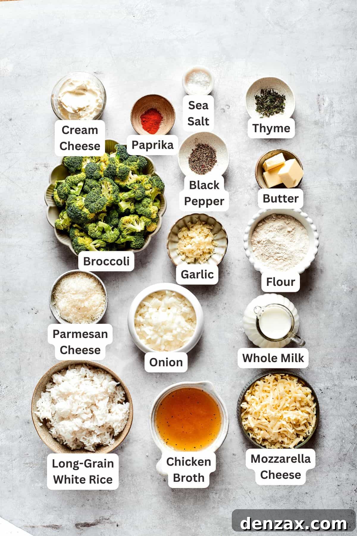 Labeled ingredients for broccoli & rice casserole: broccoli, white rice, paprika, salt and pepper, garlic, flour, thyme, butter, onion, Parmesan, cheddar, mozzarella.
