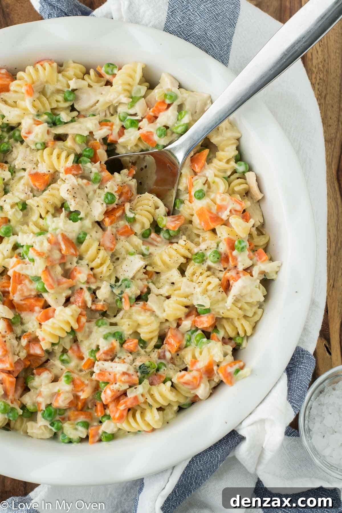 Chicken Pot Pie Pasta garnished with fresh herbs, ready to be served