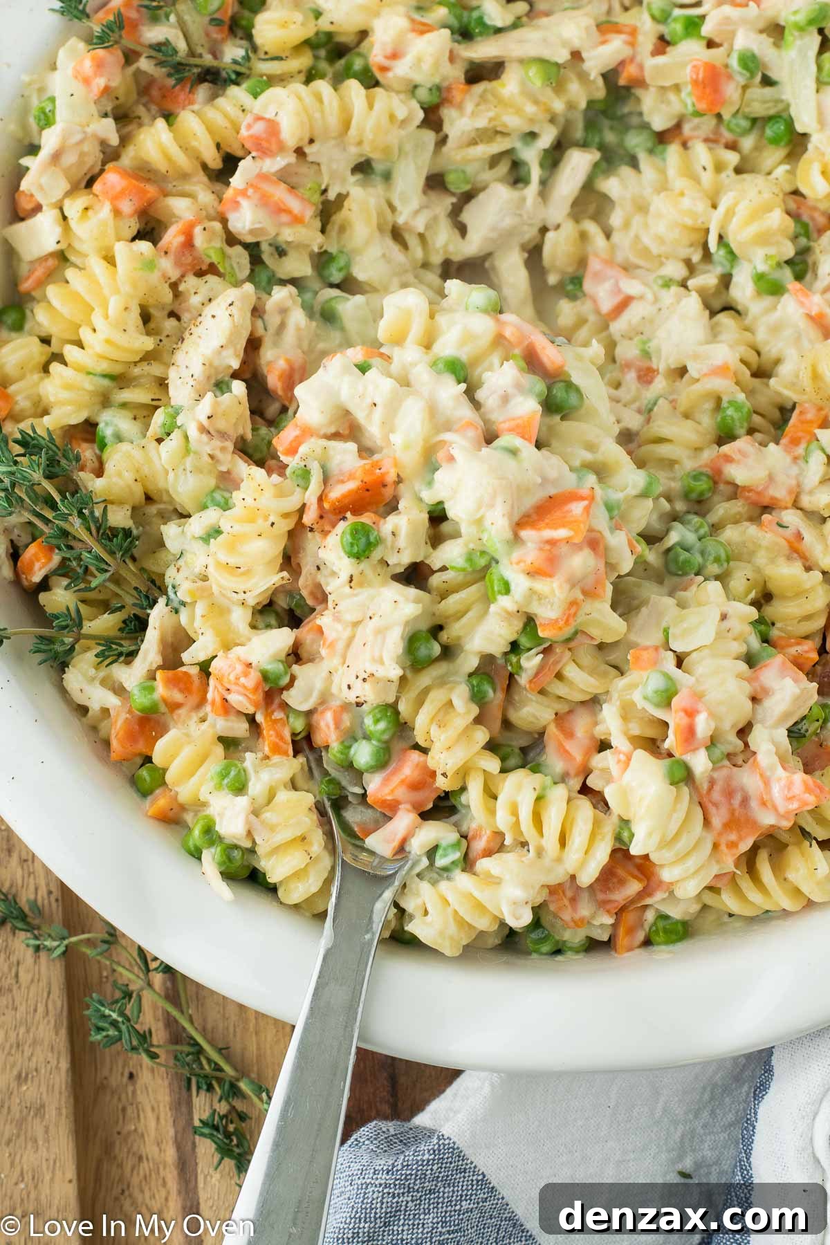 Top-down view of a chicken pot pie, illustrating the classic inspiration for the pasta dish