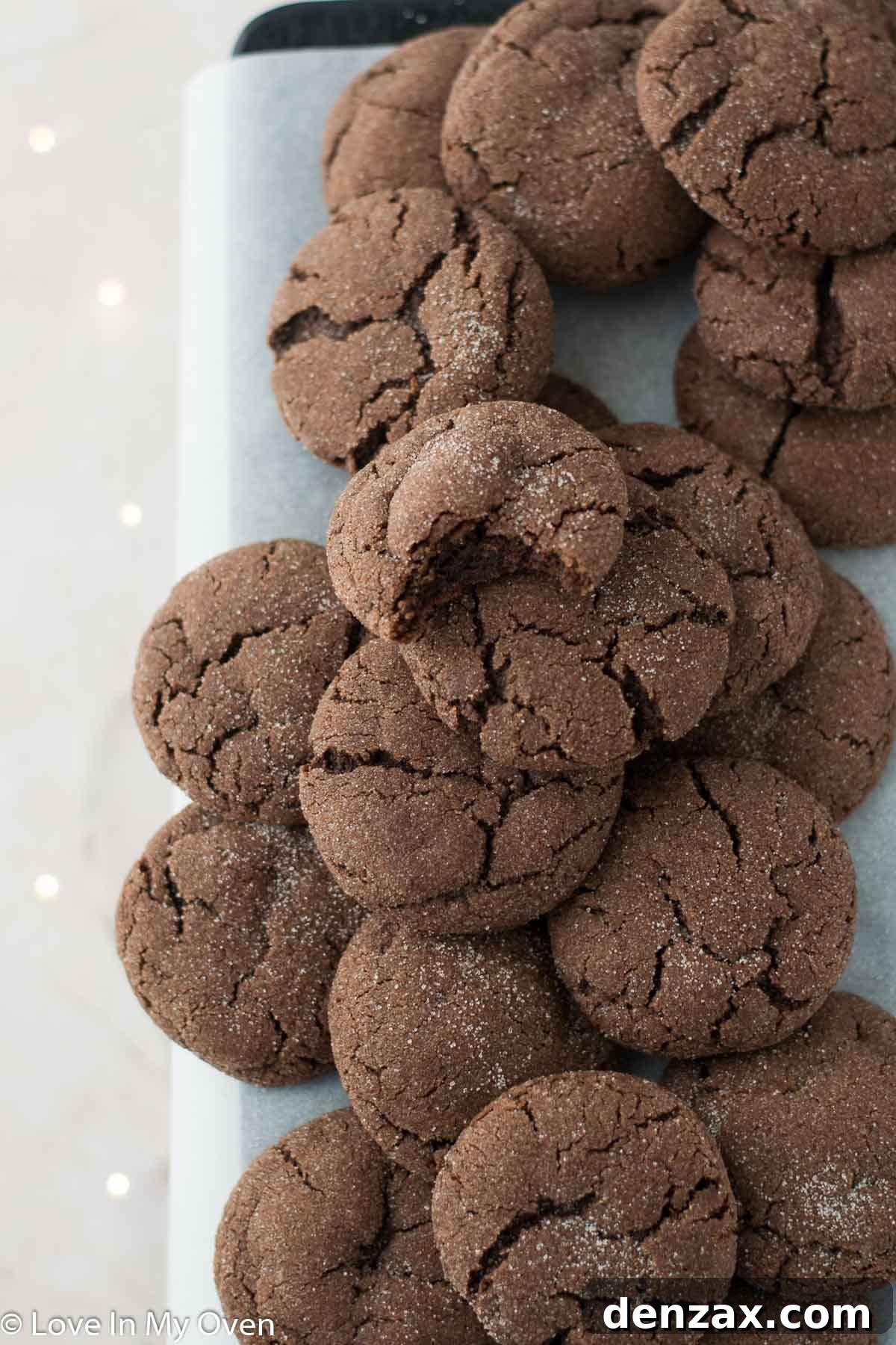 Close-up of a plate of chocolate snickerdoodles, highlighting their texture