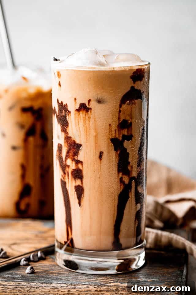 side shot of drinking glasses filled with iced coffee