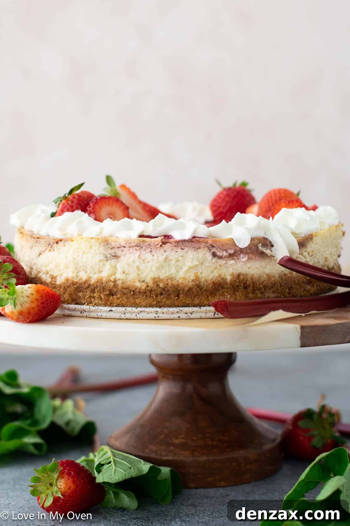 Homemade Strawberry Rhubarb Cheesecake ready to be served